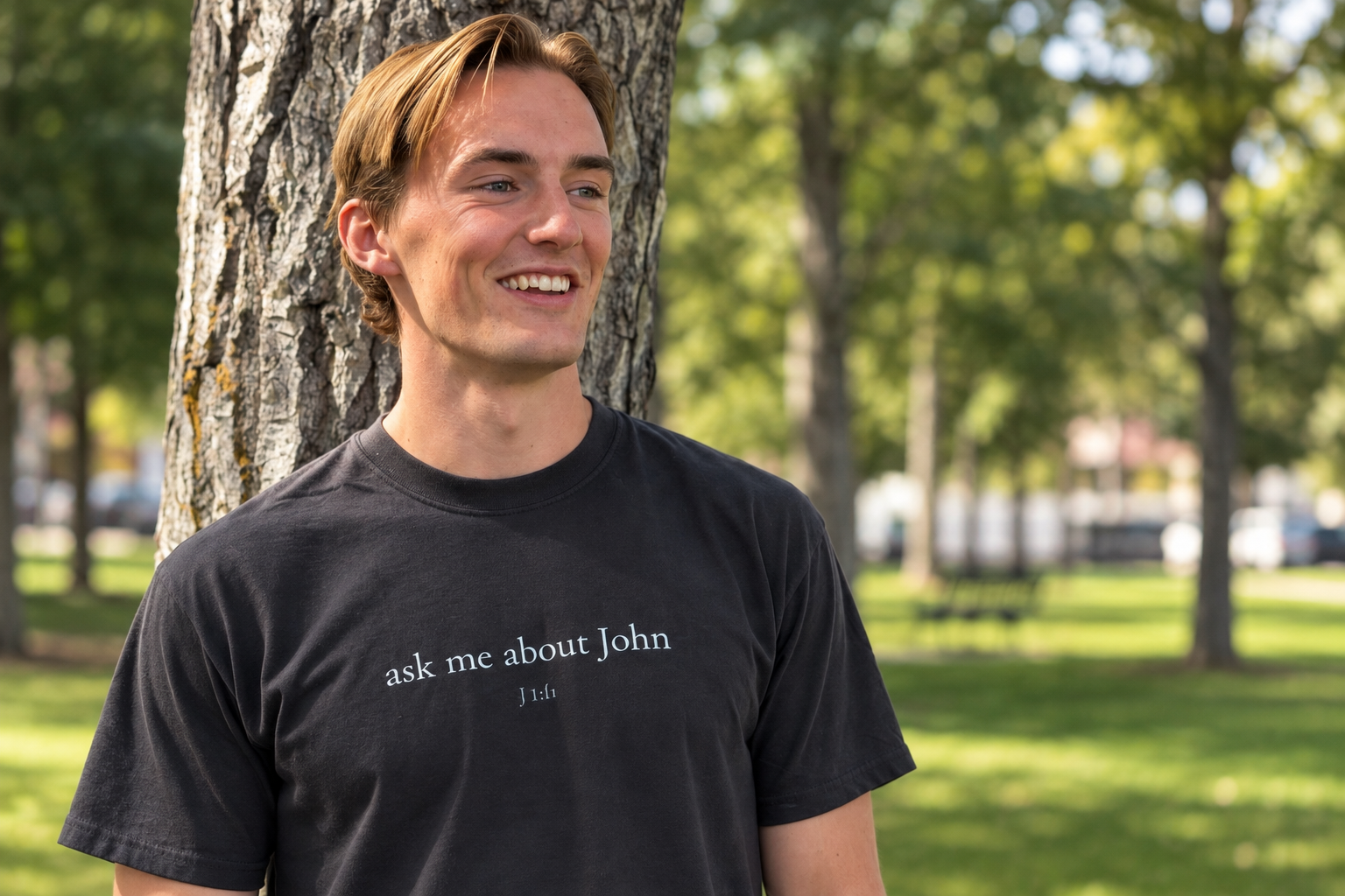Man wearing a Sow & Cover ask me about John shirt outdoors